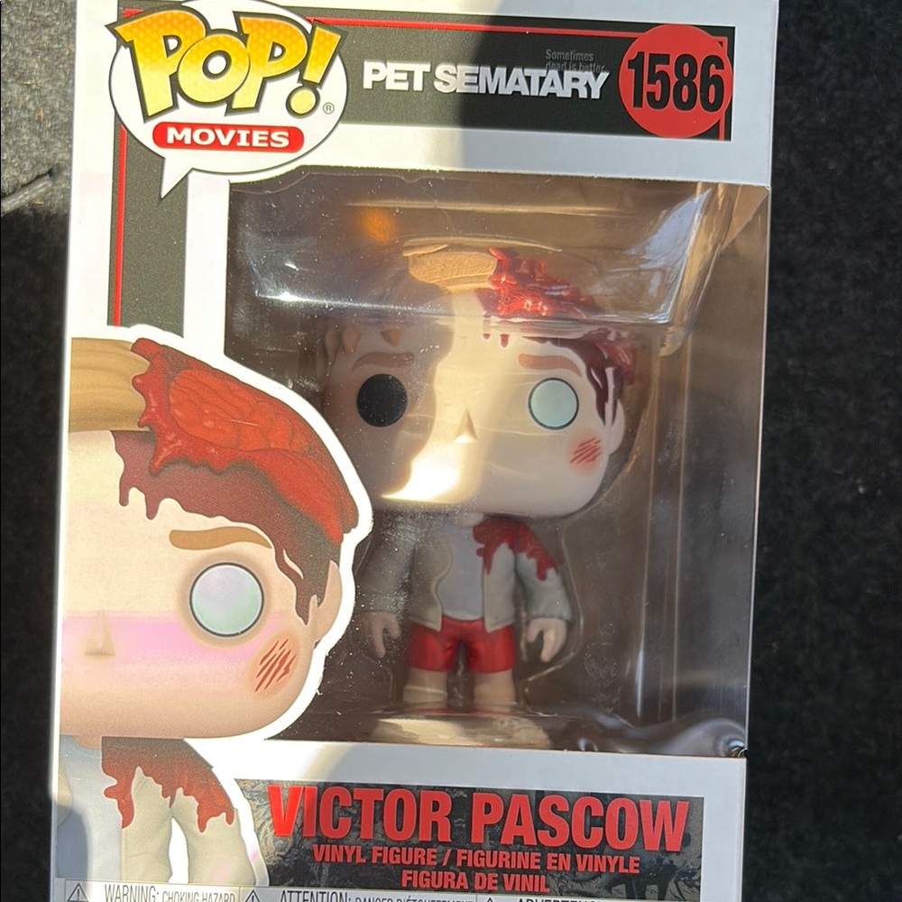 Funko Victor Pascow Figure - Red and Gray